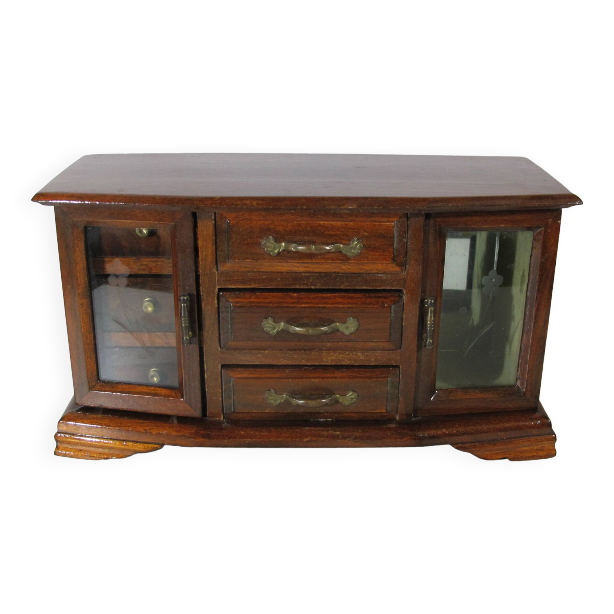 Wooden jewelry box in the shape of a dresser