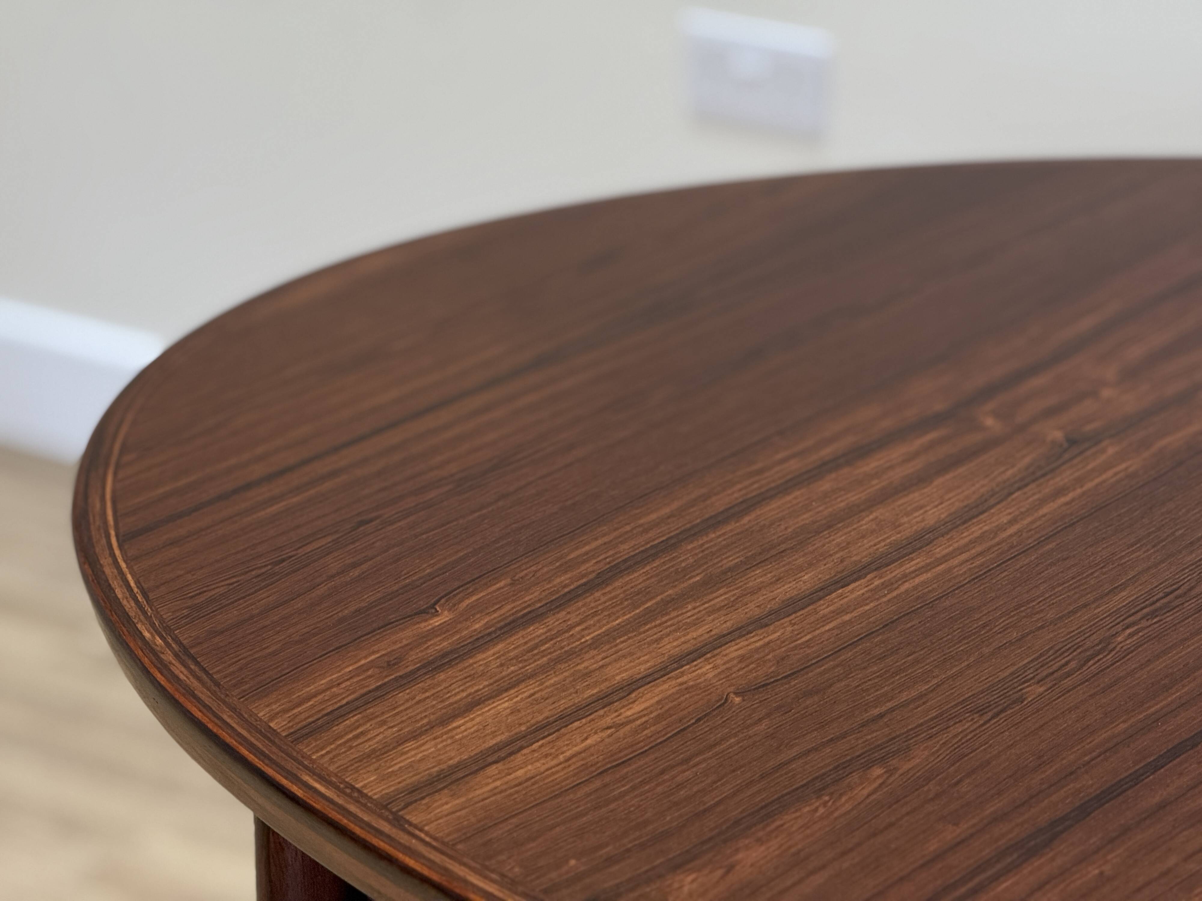 Extendable dining room table and chairs (by Kristian Solmer Vedel)