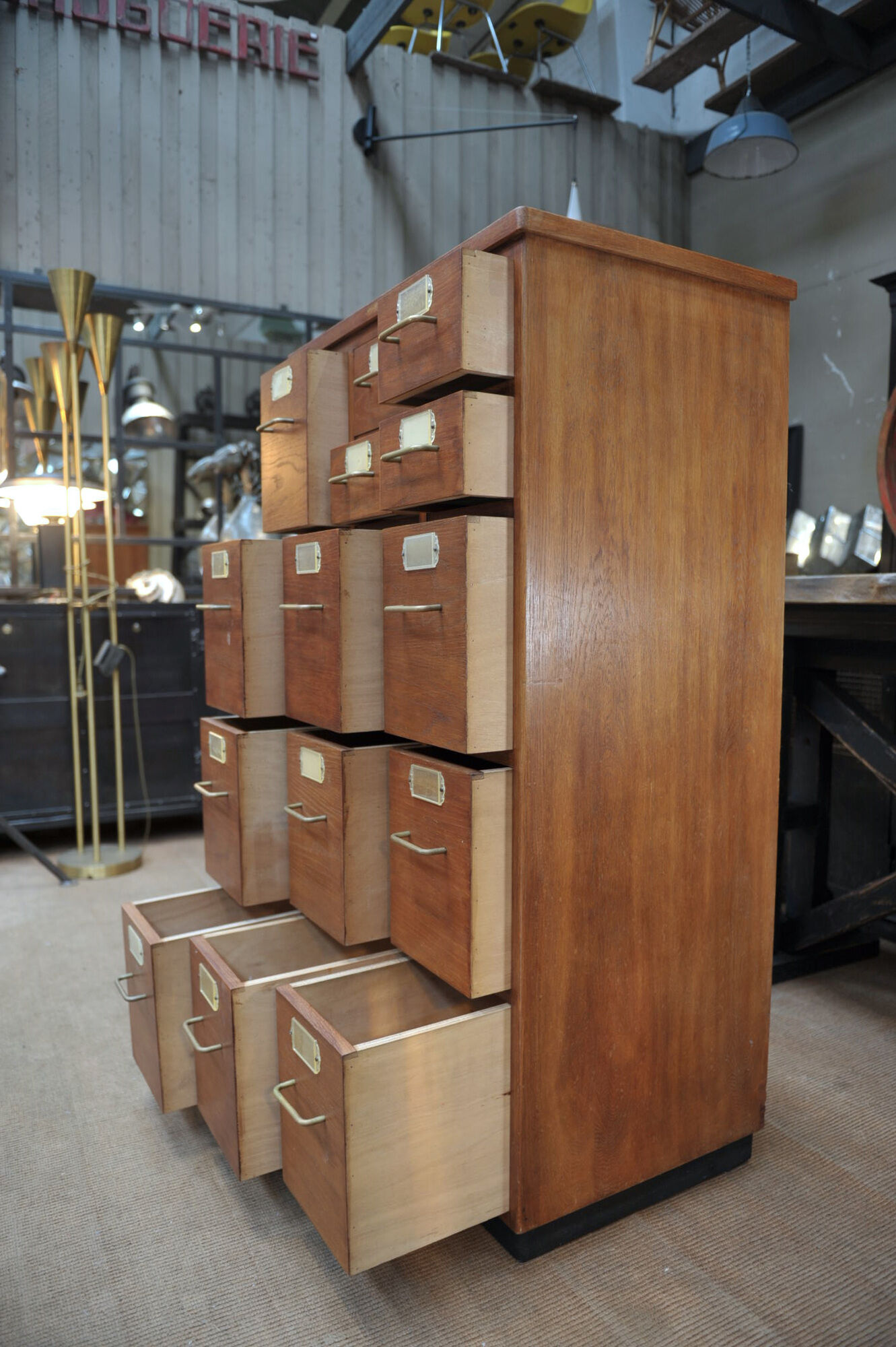 Office furniture has oak drawers 1950 brass handles and label holders