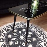 Coffee table, year 60, black with floral patterns