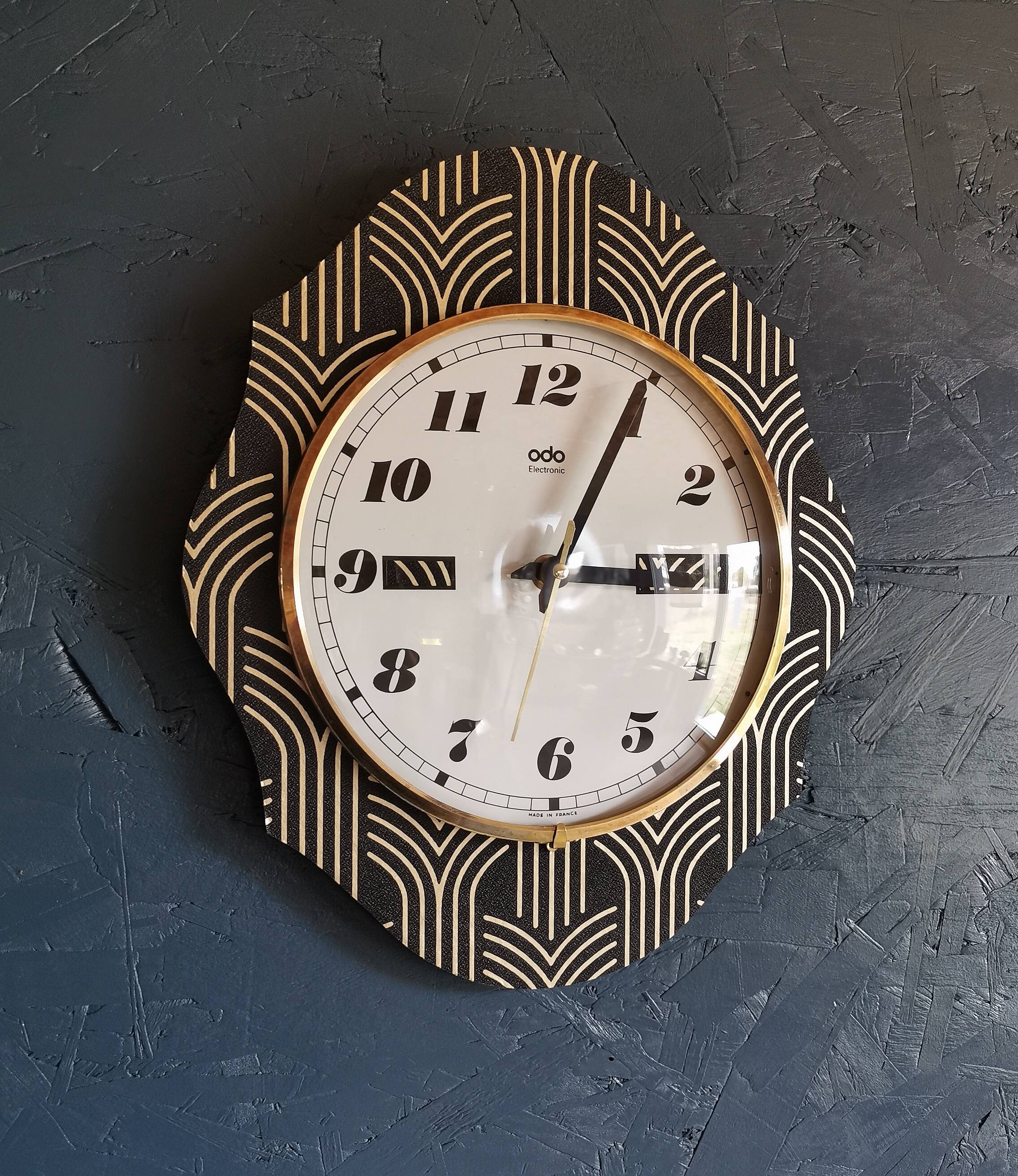 Vintage formica clock silent wall pendulum "Odo black gold"