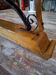 Large polished granite dining table on an oak and iron base.