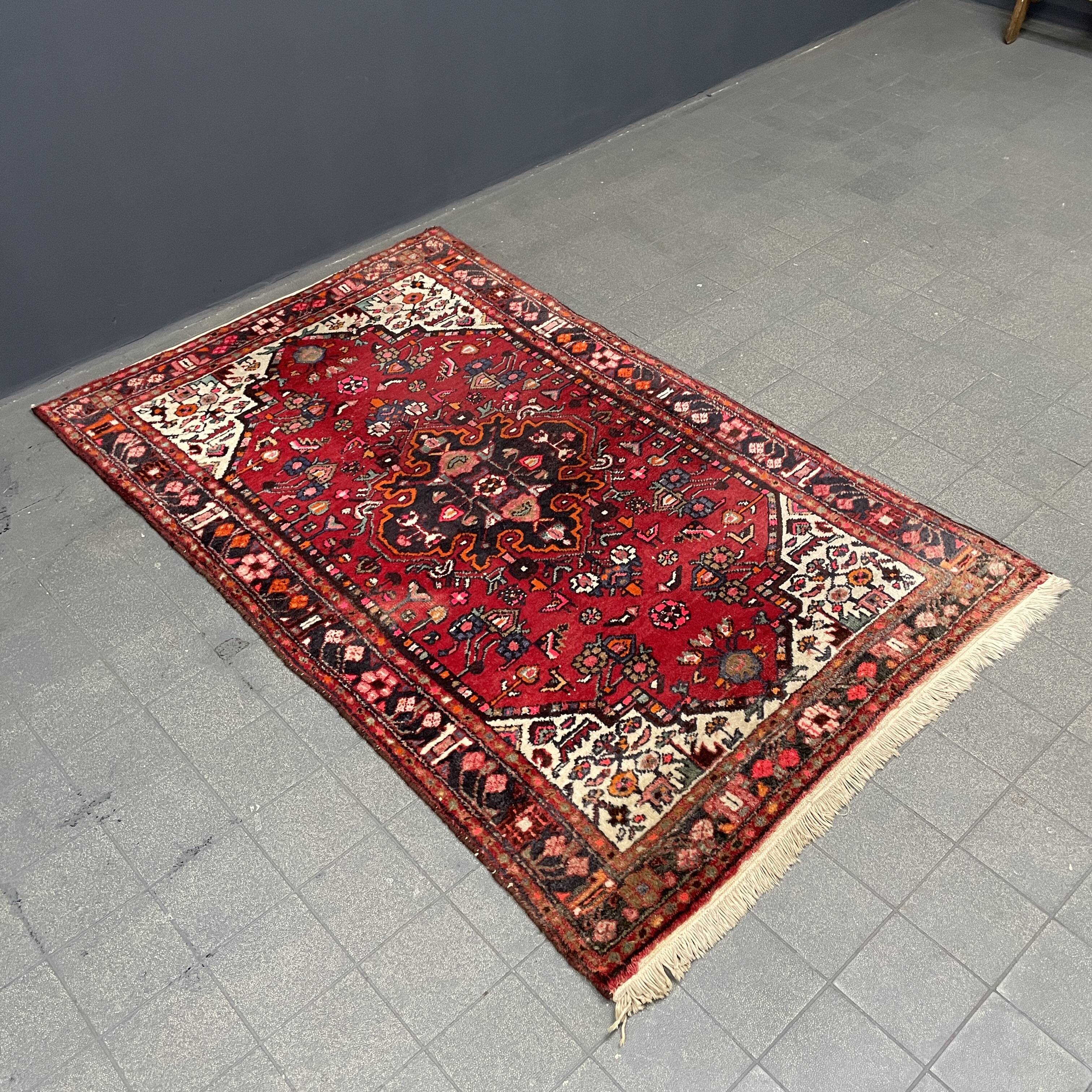 Worn vintage oriental rug or carpet