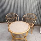 Vintage rattan wicker garden furniture set with 2 shell armchairs and a bar table