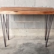 Wooden console with metal feet