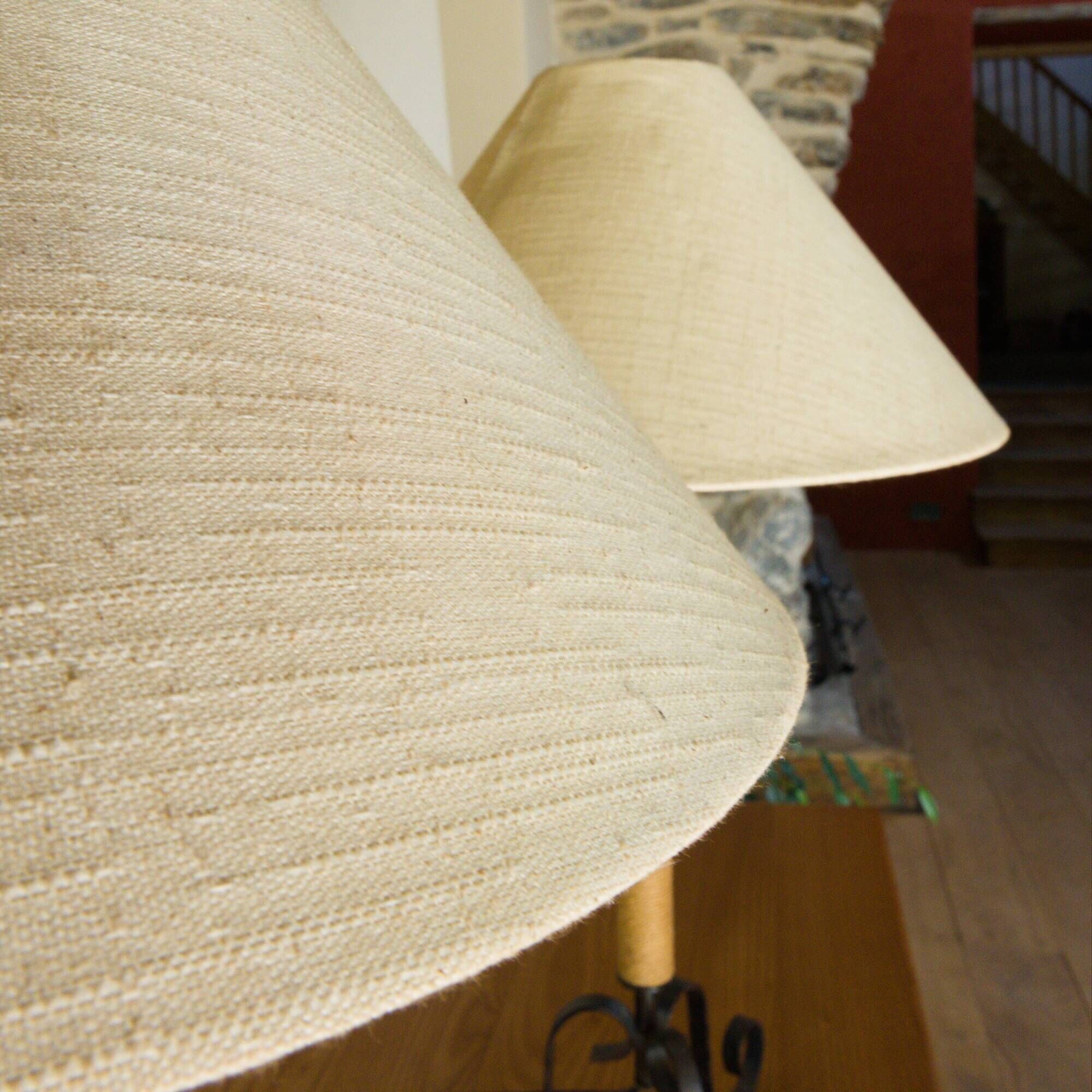 Pair of wrought iron and rope table lamps, adjustable lampshade.