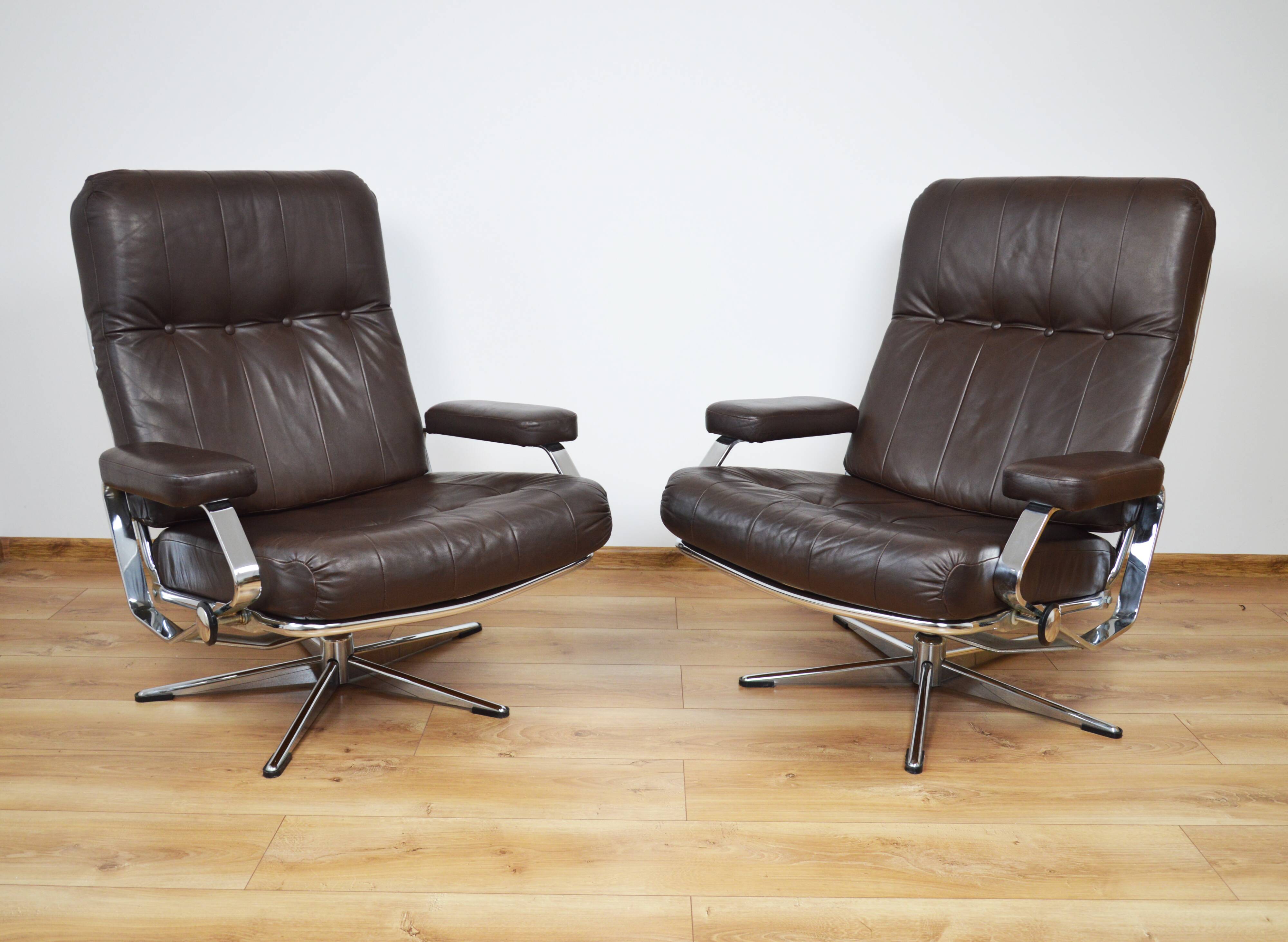 A pair of leather armchairs, 1970s
