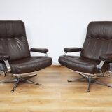 A pair of leather armchairs, 1970s