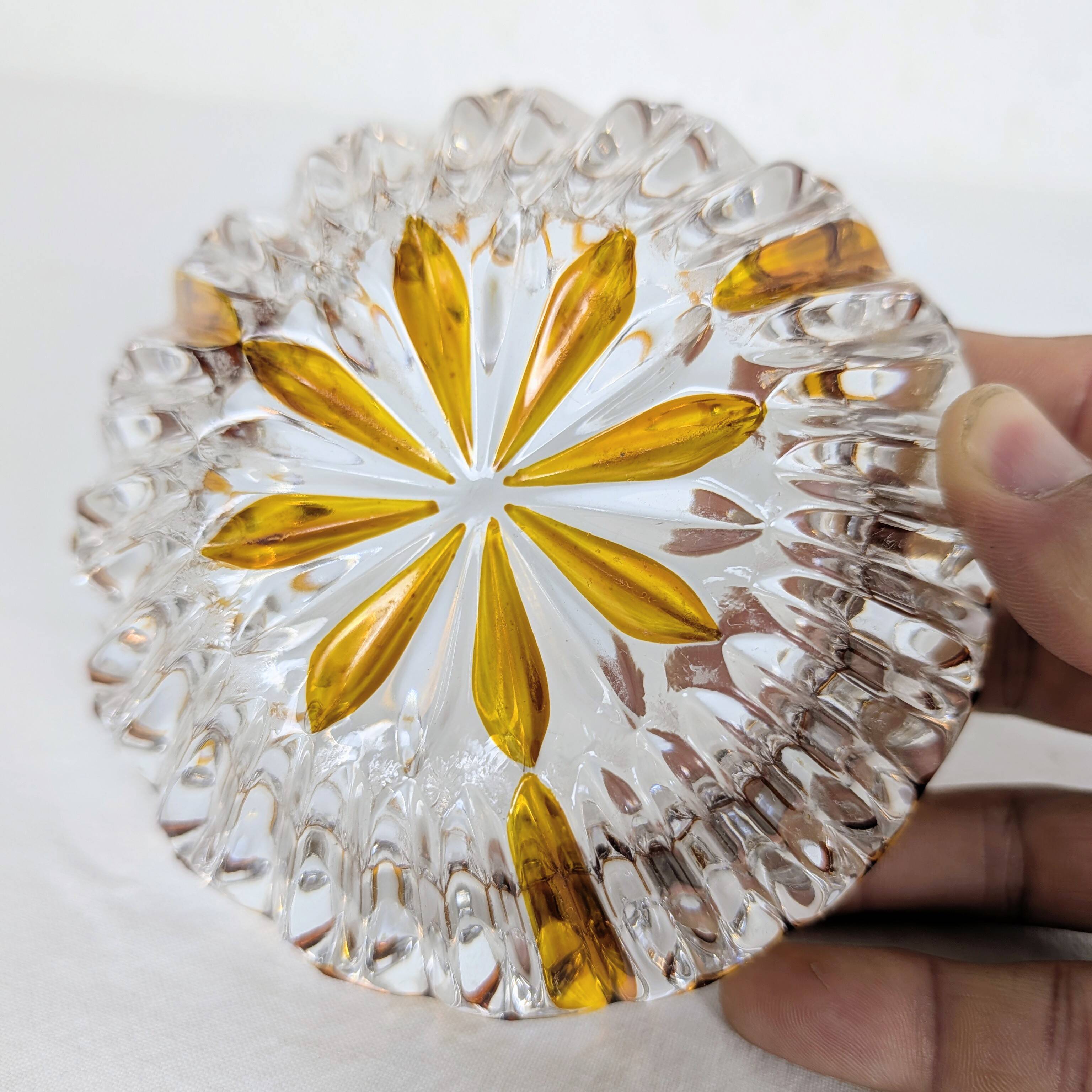 Cut glass ashtray with amber pattern