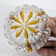 Cut glass ashtray with amber pattern