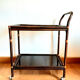 Rattan and smoked glass rolling service