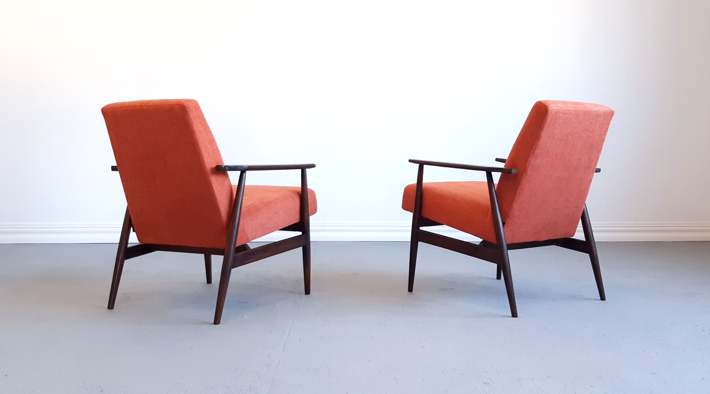 1960 Henryk Lis mid century armchair in rusty orange