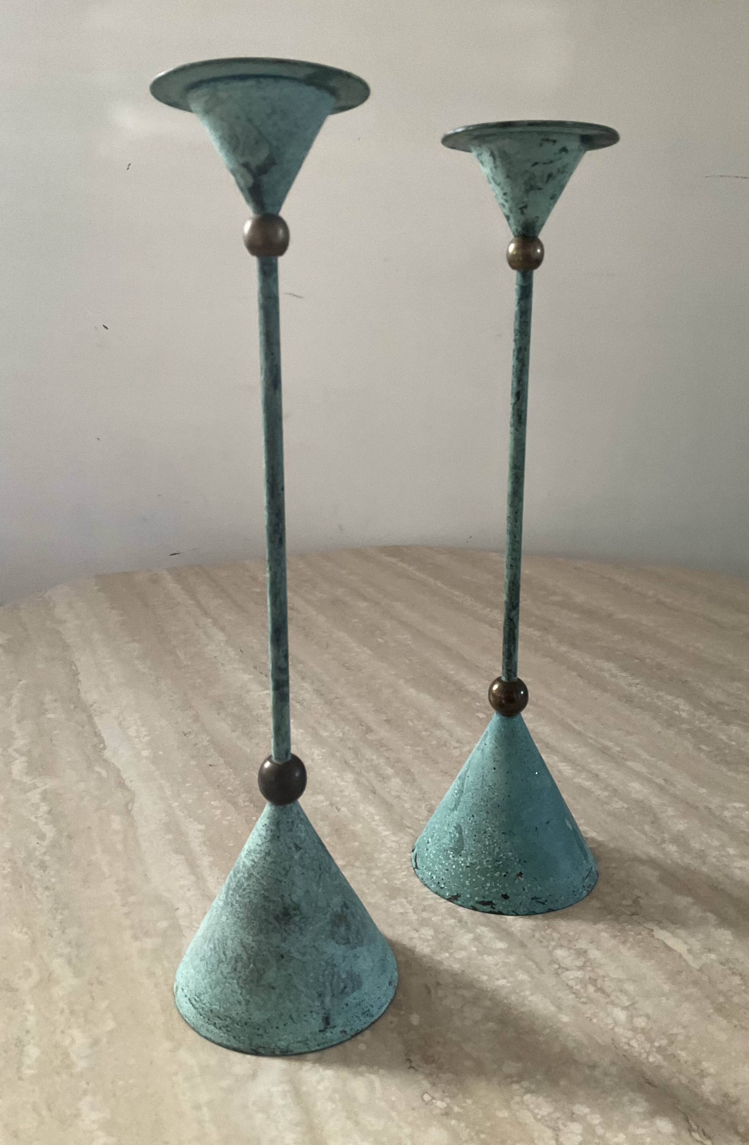 Pair of vintage brass and metal candlesticks