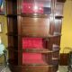 Modular display cabinet in mahogany