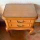 Classic carved cherry bedside table with glass top