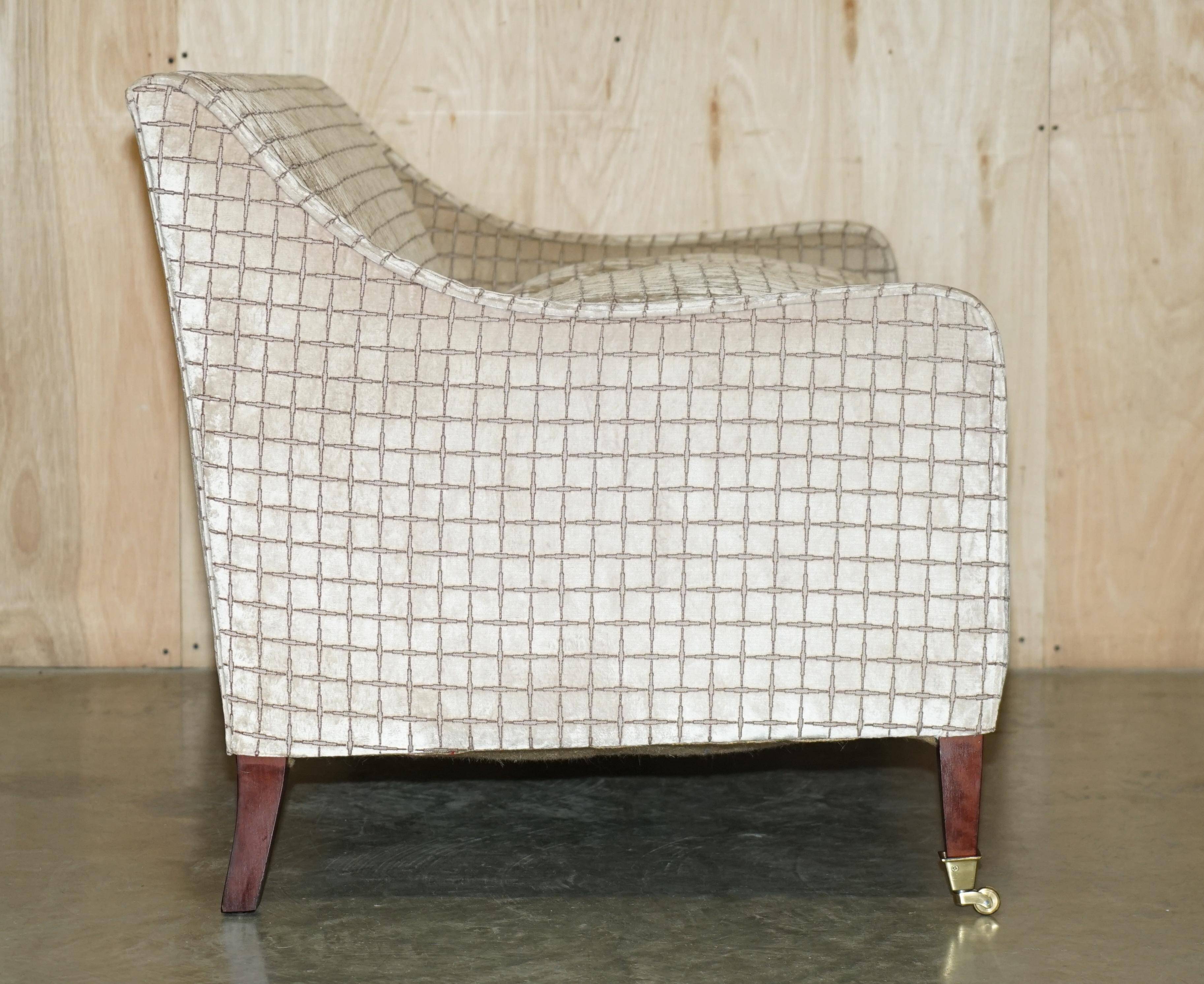 Fabric sofa and footstool, handmade in England.