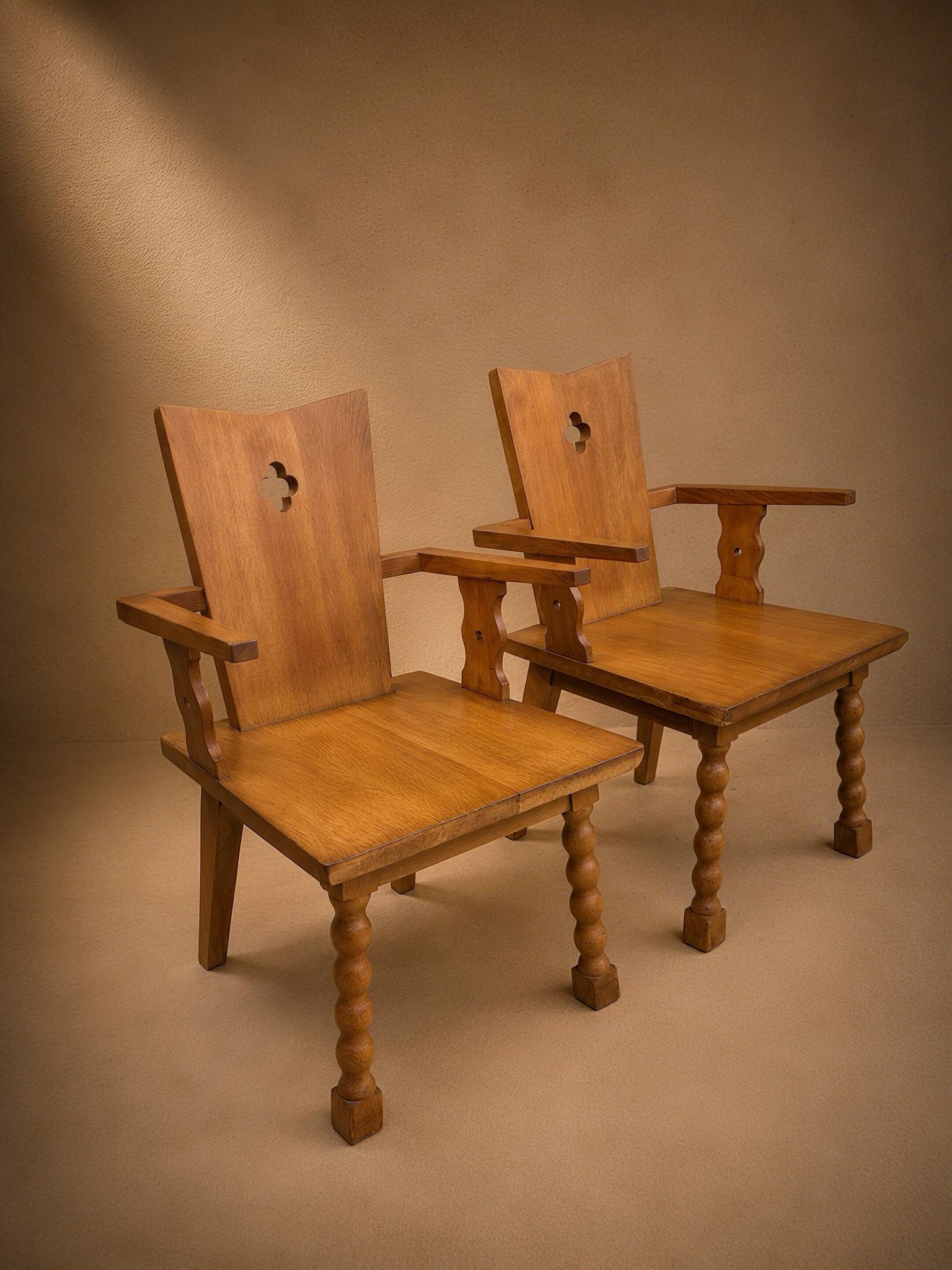 Pair of brutalist armchairs, oak, France, circa 1950.