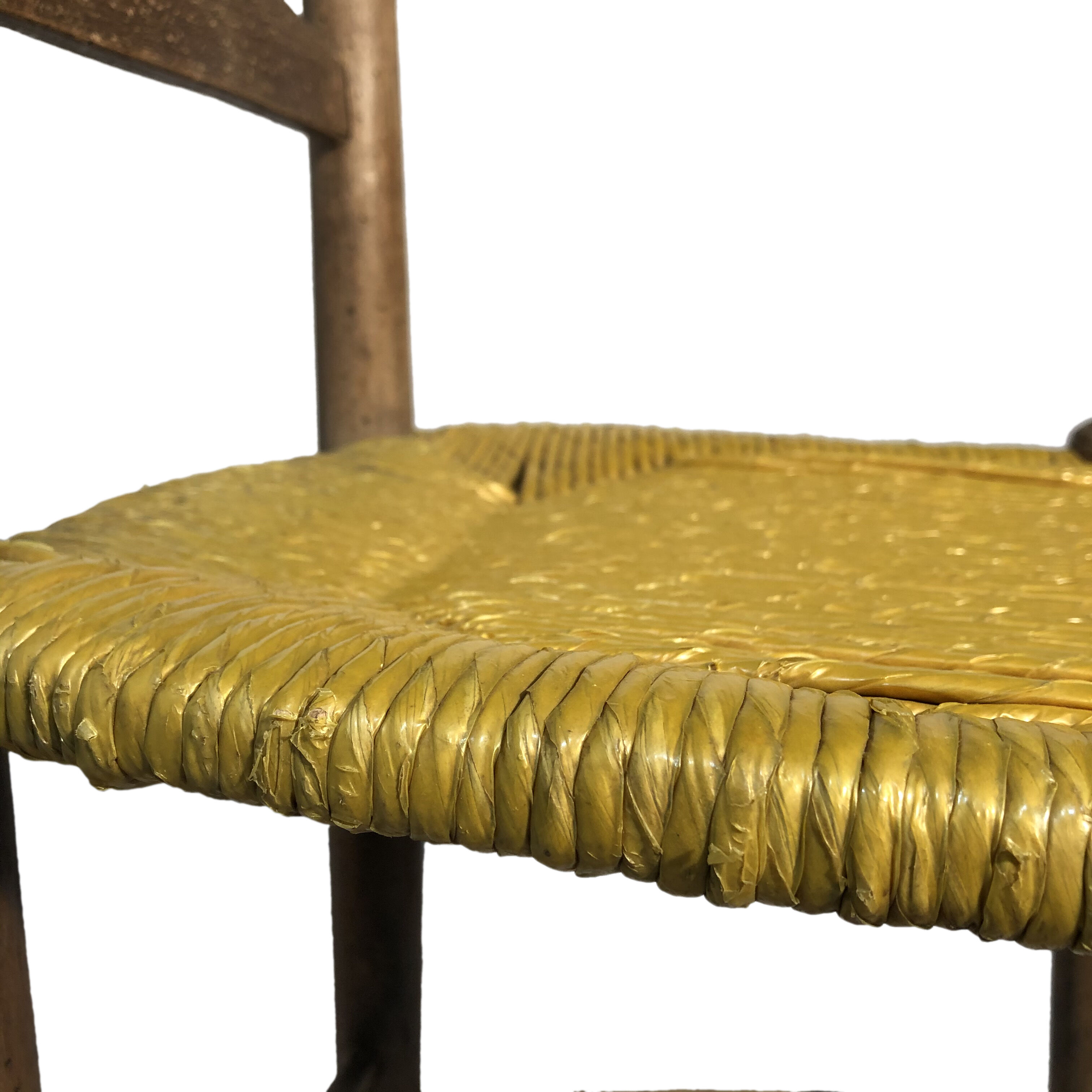 Old wooden chair, mulched seat