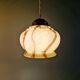 Trio of Art Deco marbled opaline pendant lights, 1920-30