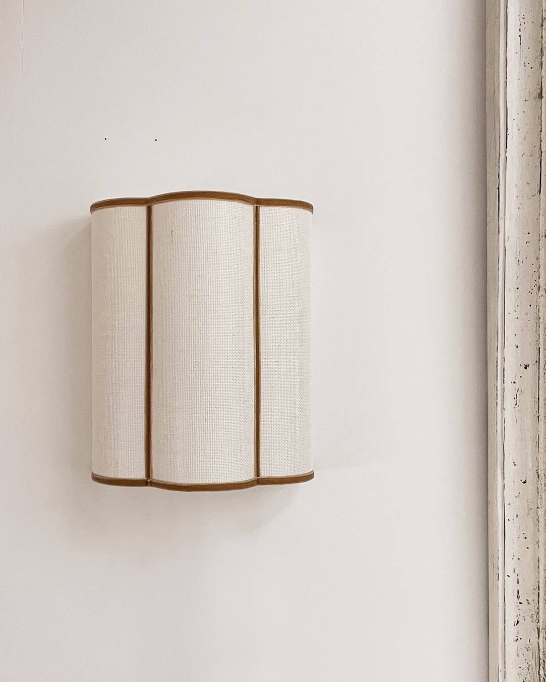 Pair of linen and velvet trim wall lights