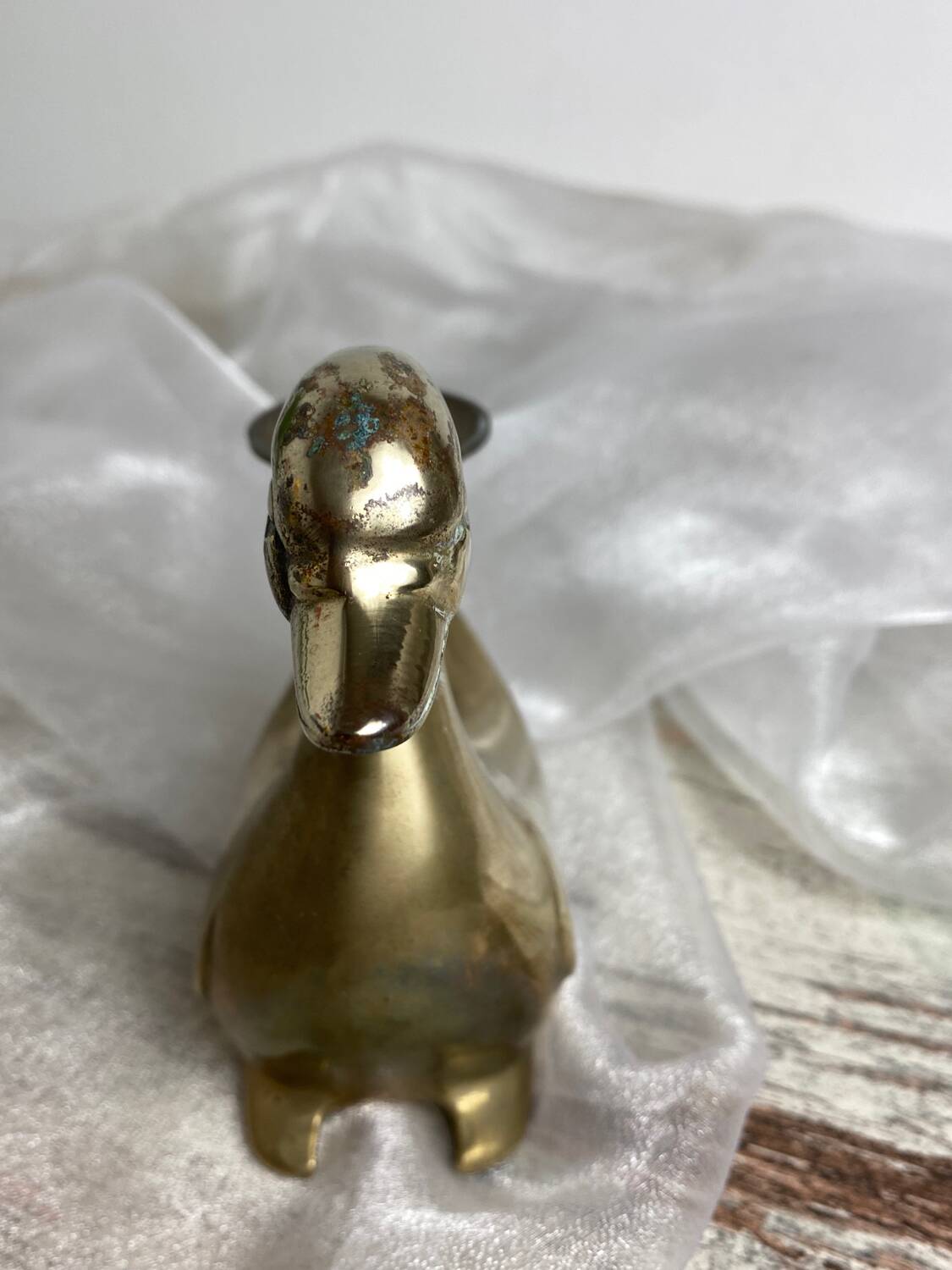 Brass swan-shaped candlestick
