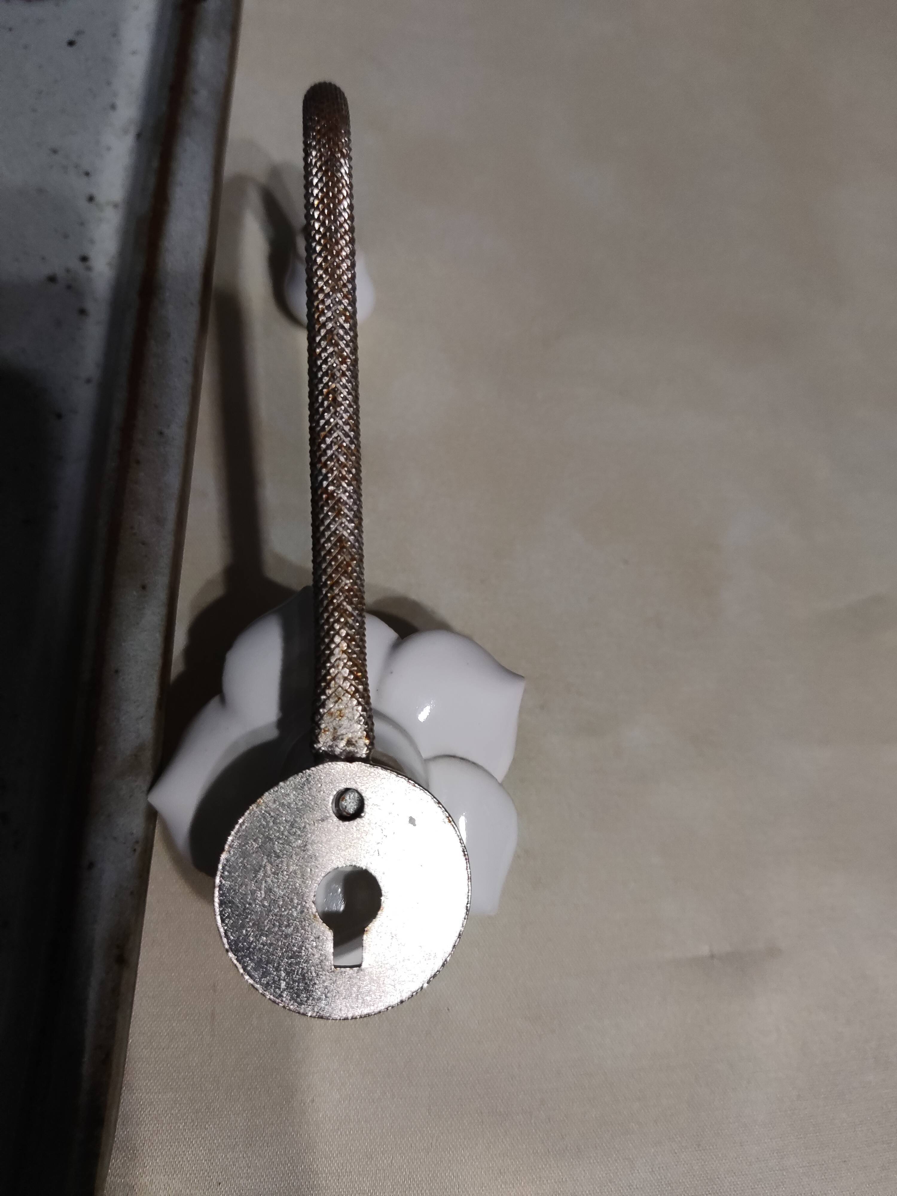 Pair of porcelain hooks