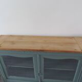 Console, sideboard, shallow display case sublimated in smoky green, wooden top.