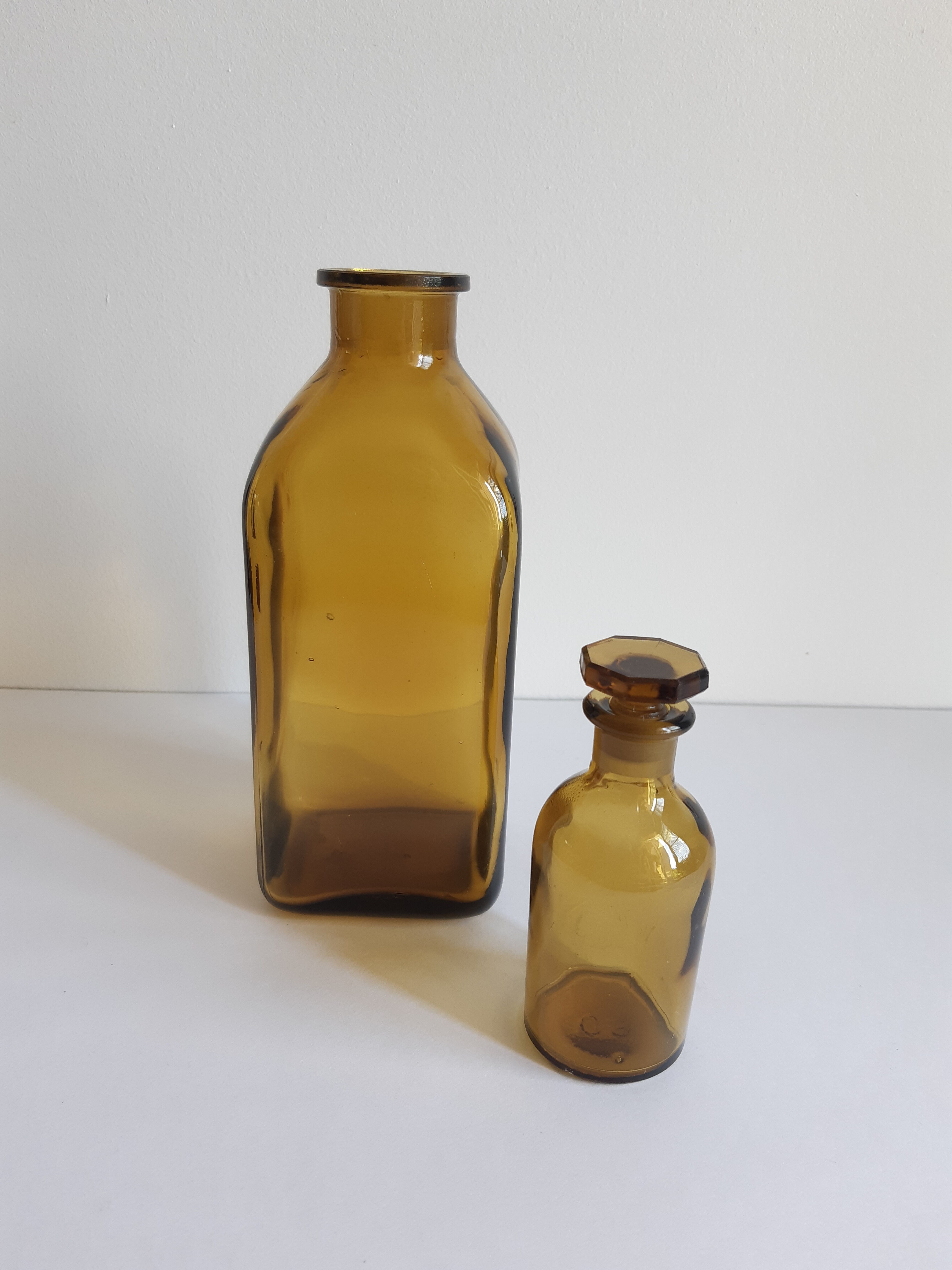 Set of 2 vintage glass bottles