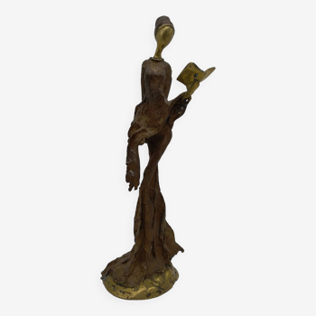 African bronze statuette. The storyteller.
