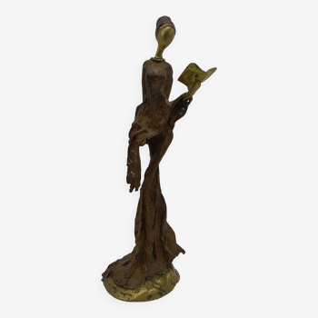 Statuette africaine en bronze . La conteuse .