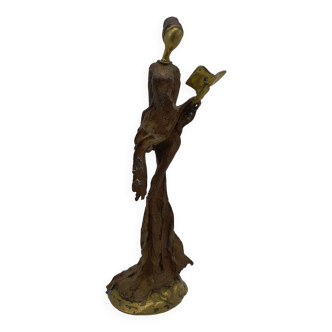 Statuette africaine en bronze . La conteuse .