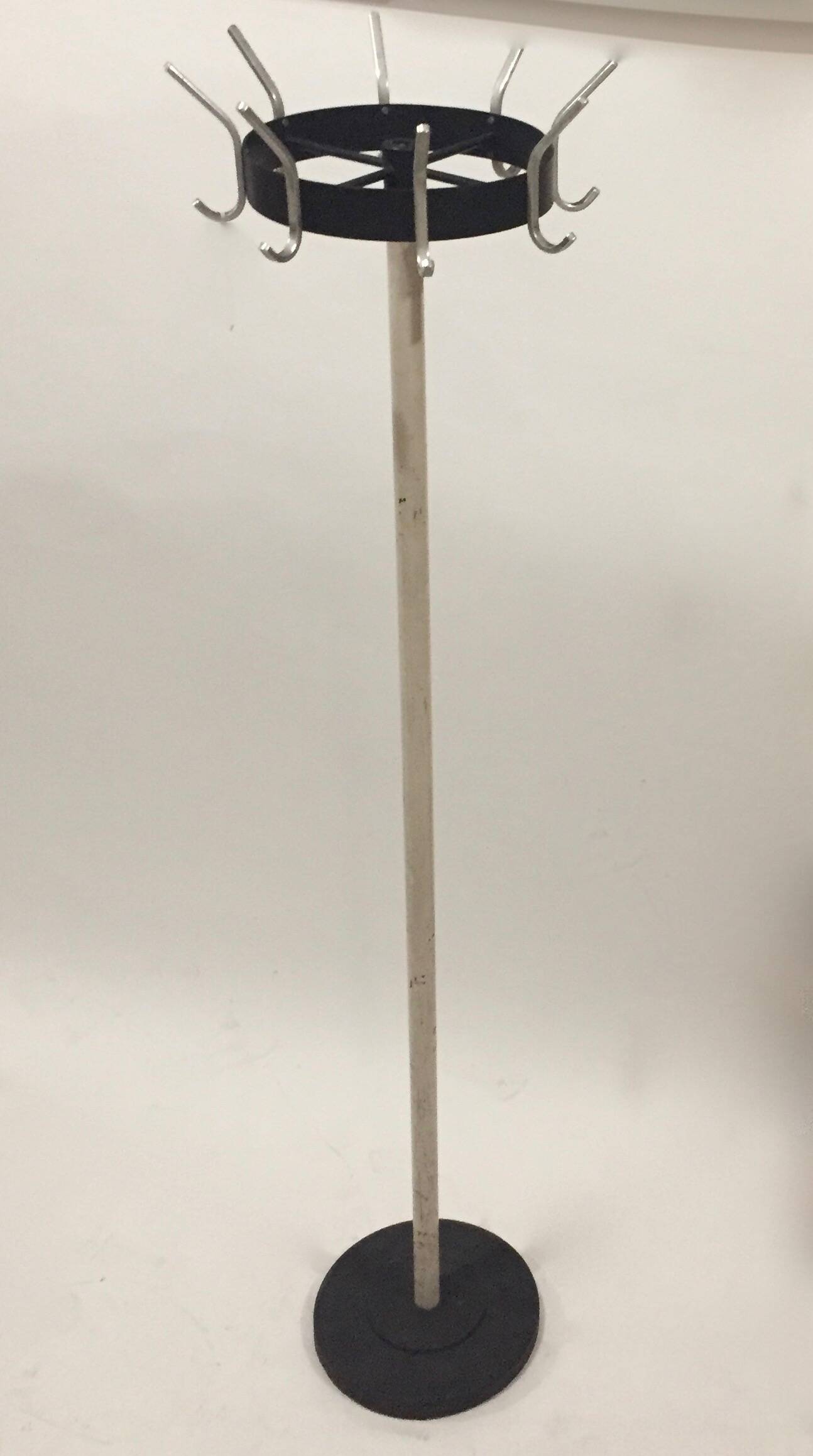 Coat rack on turnstile stand