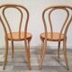 Pair of curved wooden bistro chairs
