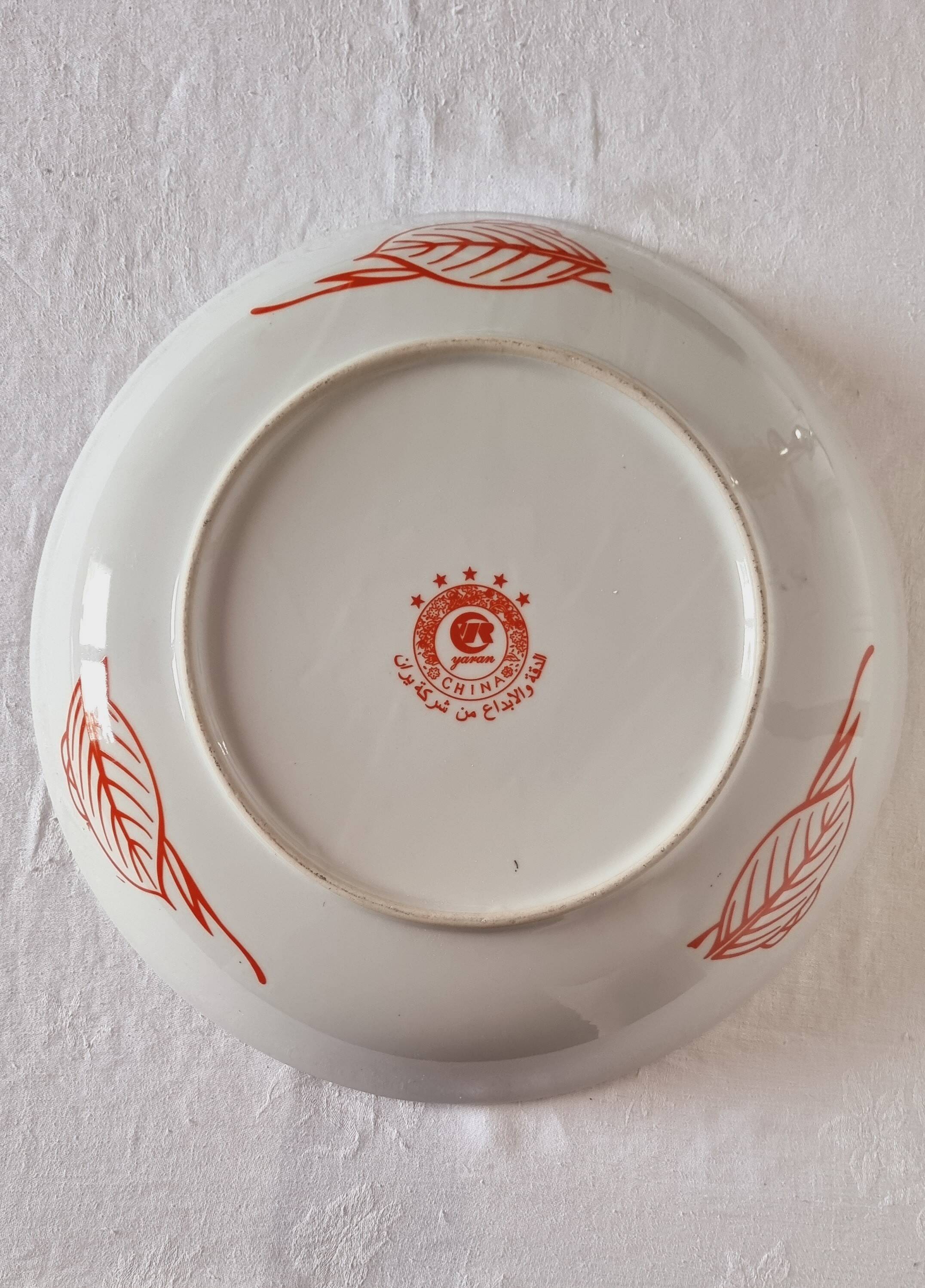 Large deep porcelain plate in Imari style (35.5 cm) with "Phe" decoration.