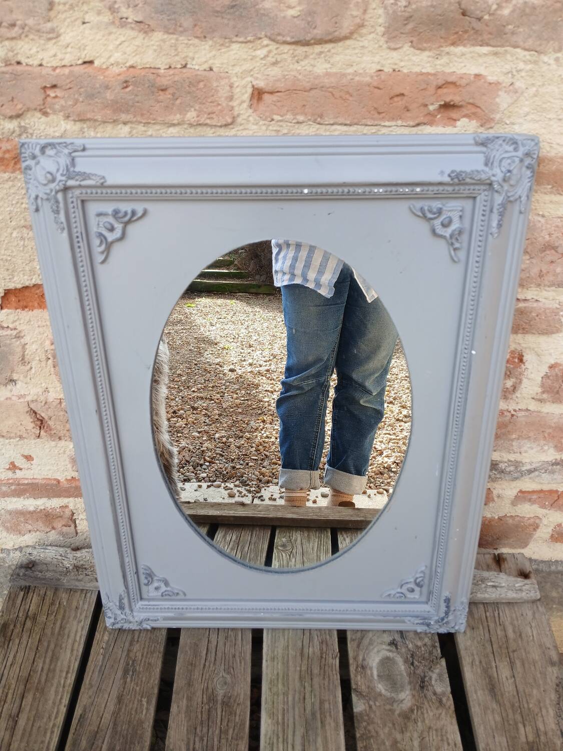 Mirror with a grey wooden frame