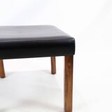 Tabouret en cuir noir et pieds en palissandre, design danois des années 1960