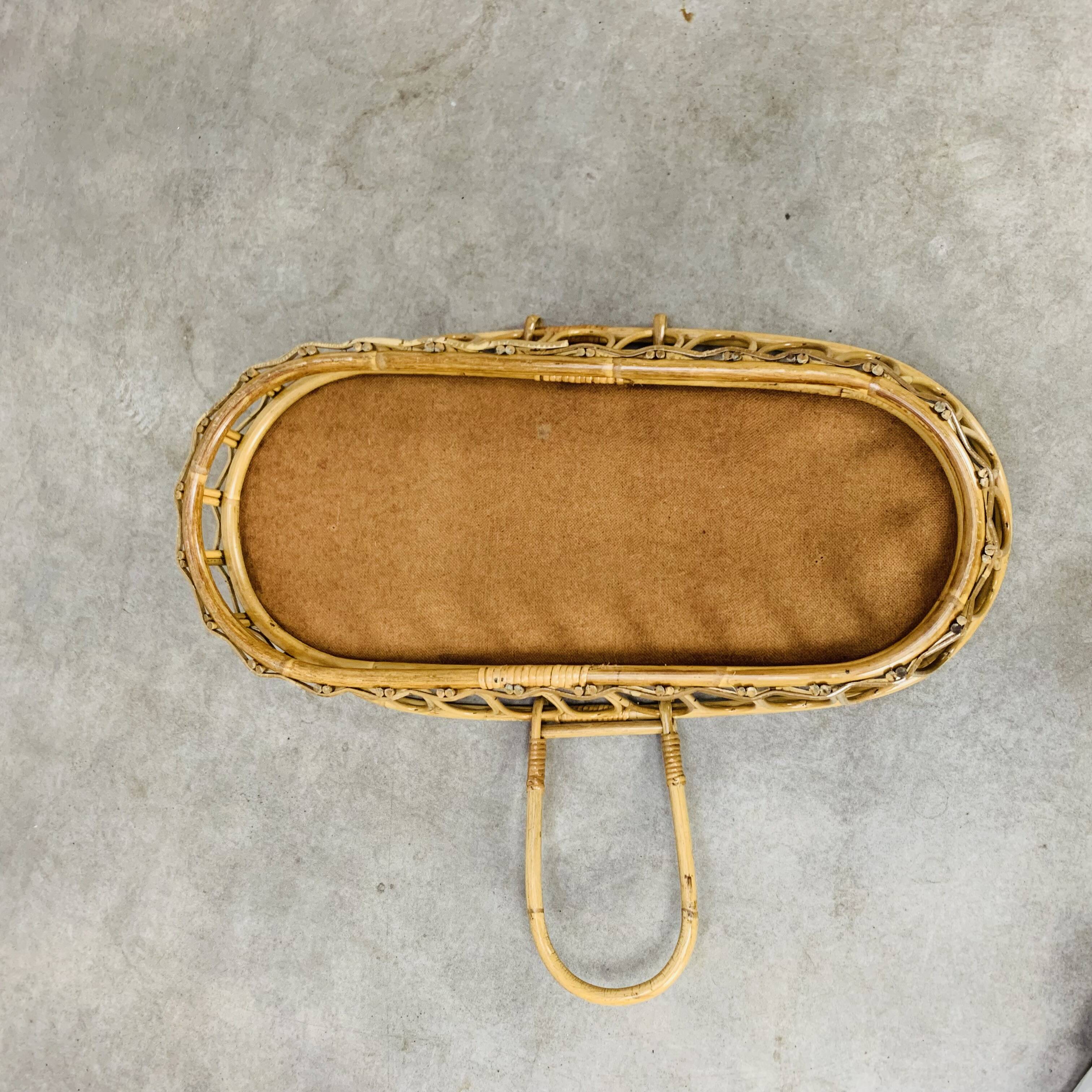 Vintage rattan baby bassinet