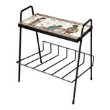 Vintage magazine table with Greek mythology motif.