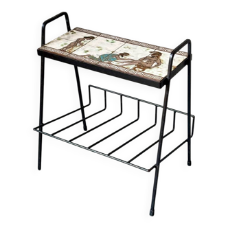 Vintage magazine table with Greek mythology motif.