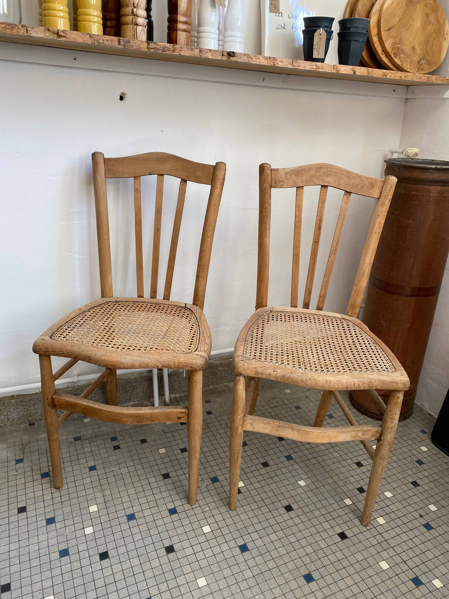 Pair of caned bistro chairs