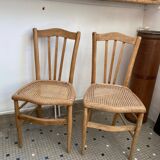 Pair of caned bistro chairs