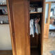 Scandinavian wooden wardrobe with sliding doors