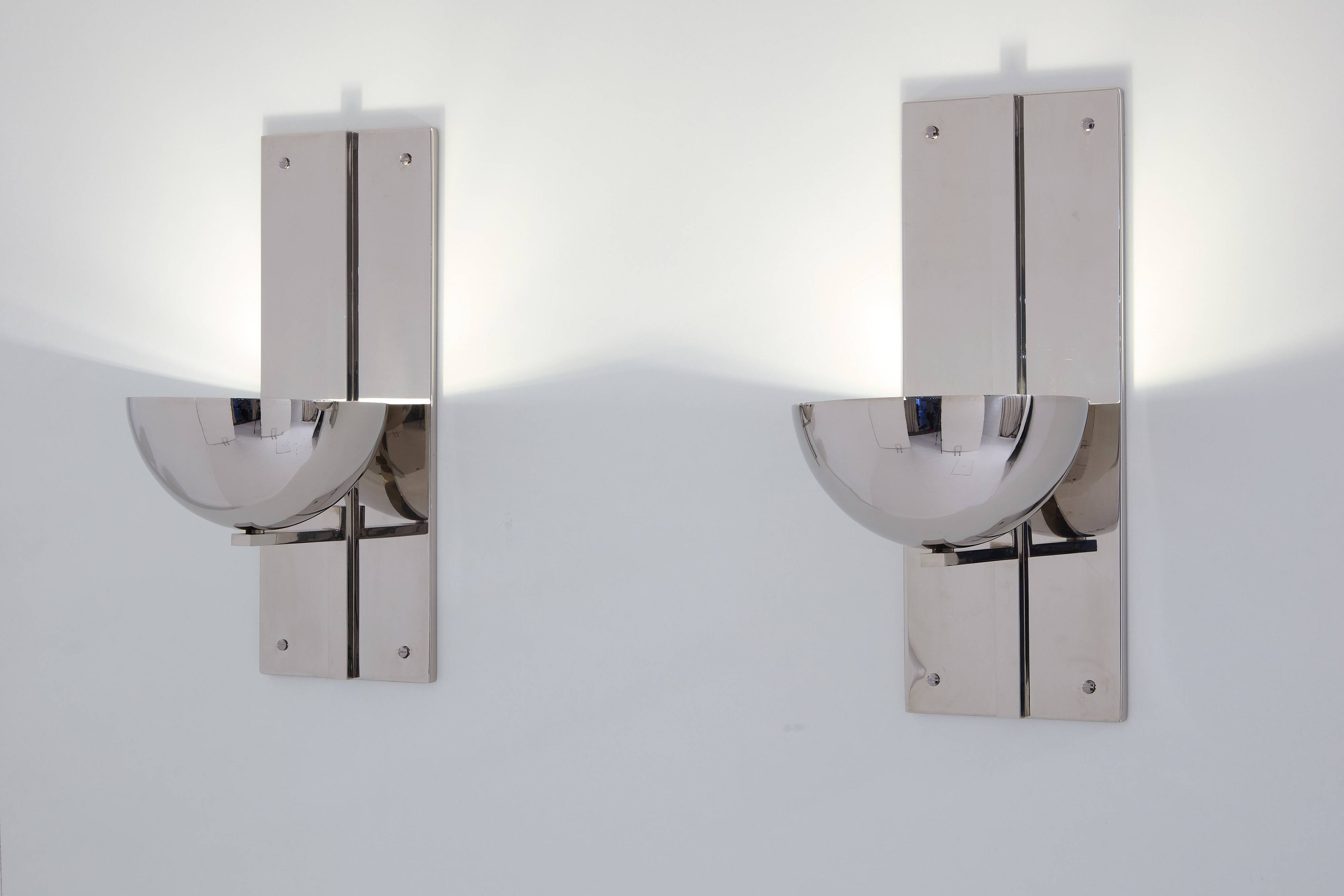 Pair of modernist wall lights by Claude Parent, nickel-plated steel, 1992.