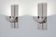 Pair of modernist wall lights by Claude Parent, nickel-plated steel, 1992.