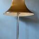 Space Age floor lamp by Willem Hagoort with a beige witch hat-shaped shade.