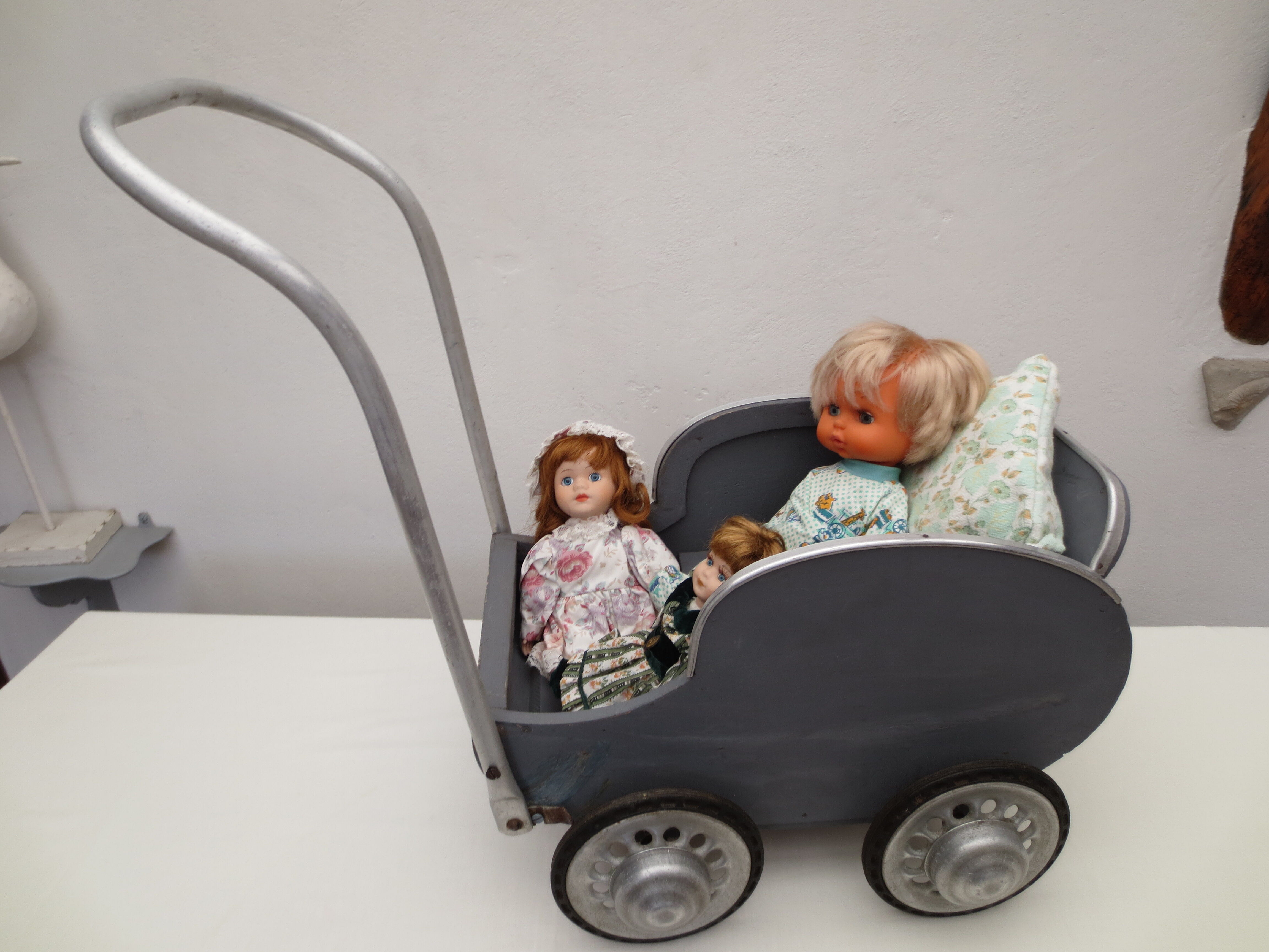 40 year old doll stroller, wood and aluminum
