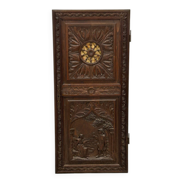 Porte d’armoire sculptée et ajourée