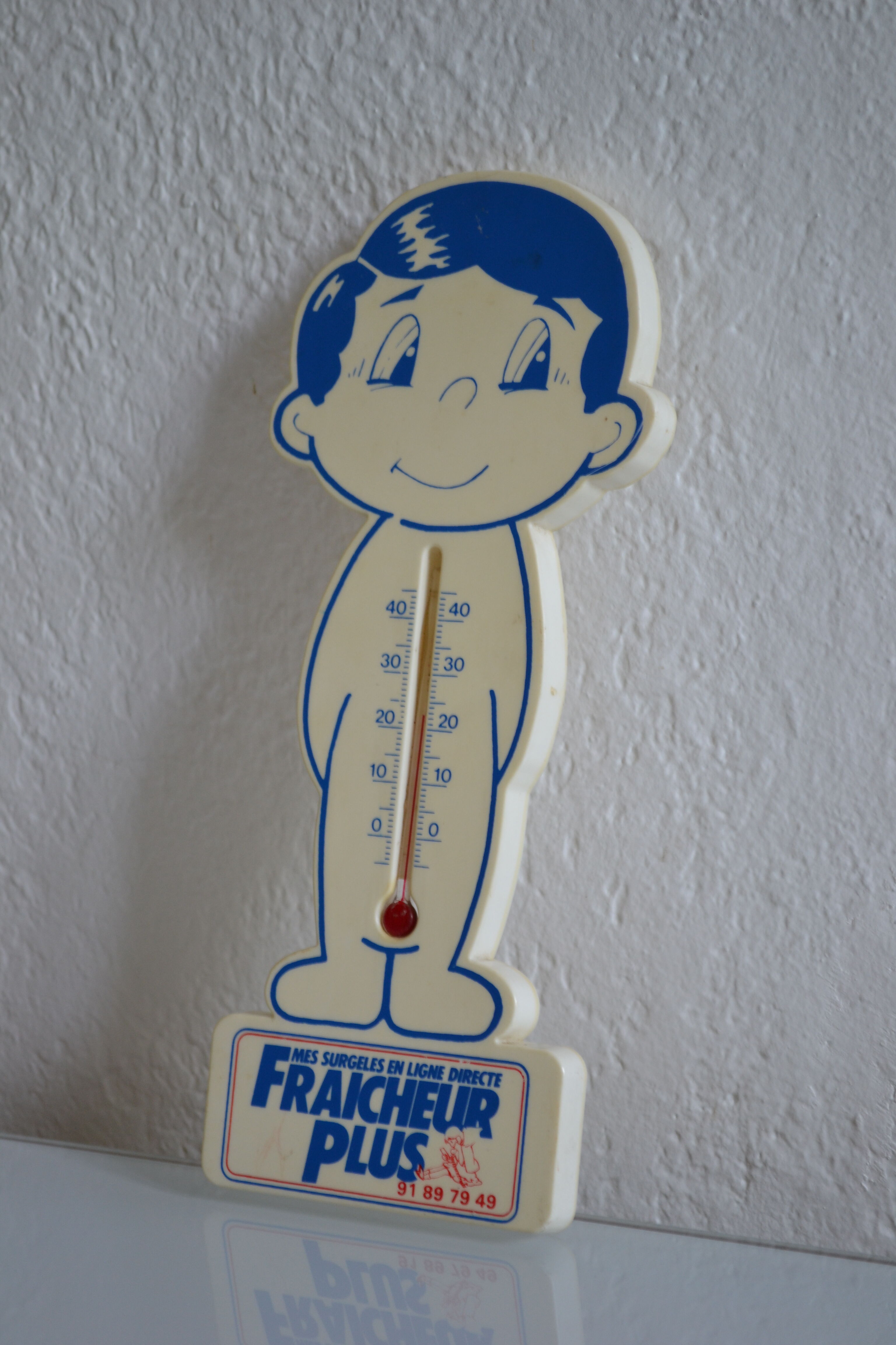 Vintage advertising thermometer