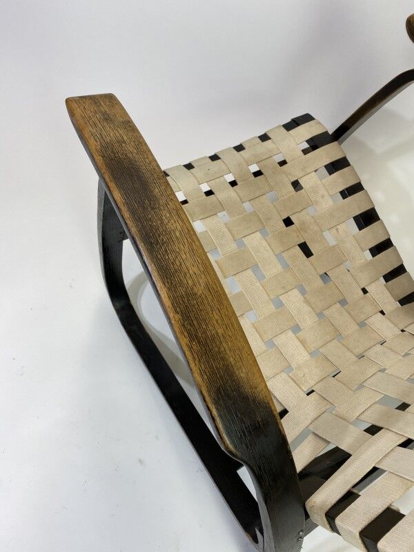 Vintage black lounge chair by Jan Vaněk