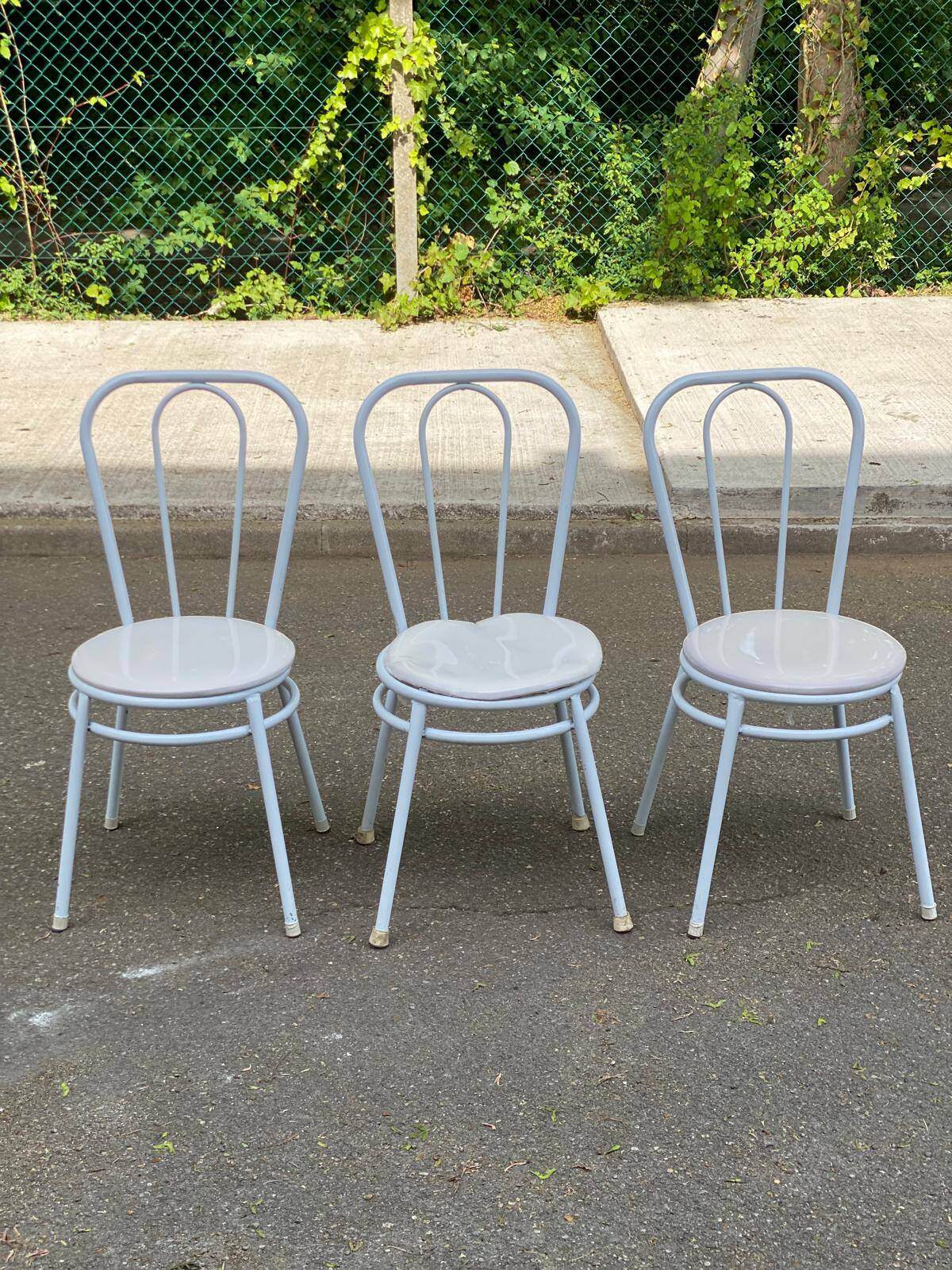 3 white steel and beige leather bistro chairs